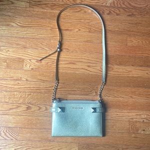 Gold, Michael Kors, folding shoulder bag. Inside credit card holder.